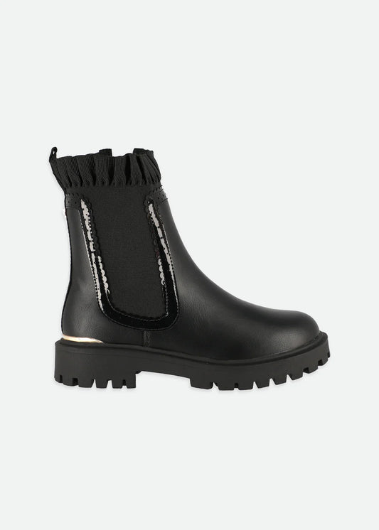 High-profile Chelsea boots with elastic gore, side zip, ruffle detail, and gold logo heart charm, featuring soft velour lining and chunky soles