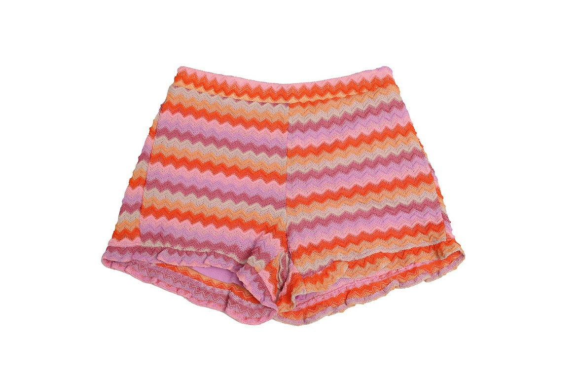 Vibrant two-piece halter short set in purple and orange, featuring a chic halter neckline, relaxed fit shorts, and elastic waistband for comfort and style.