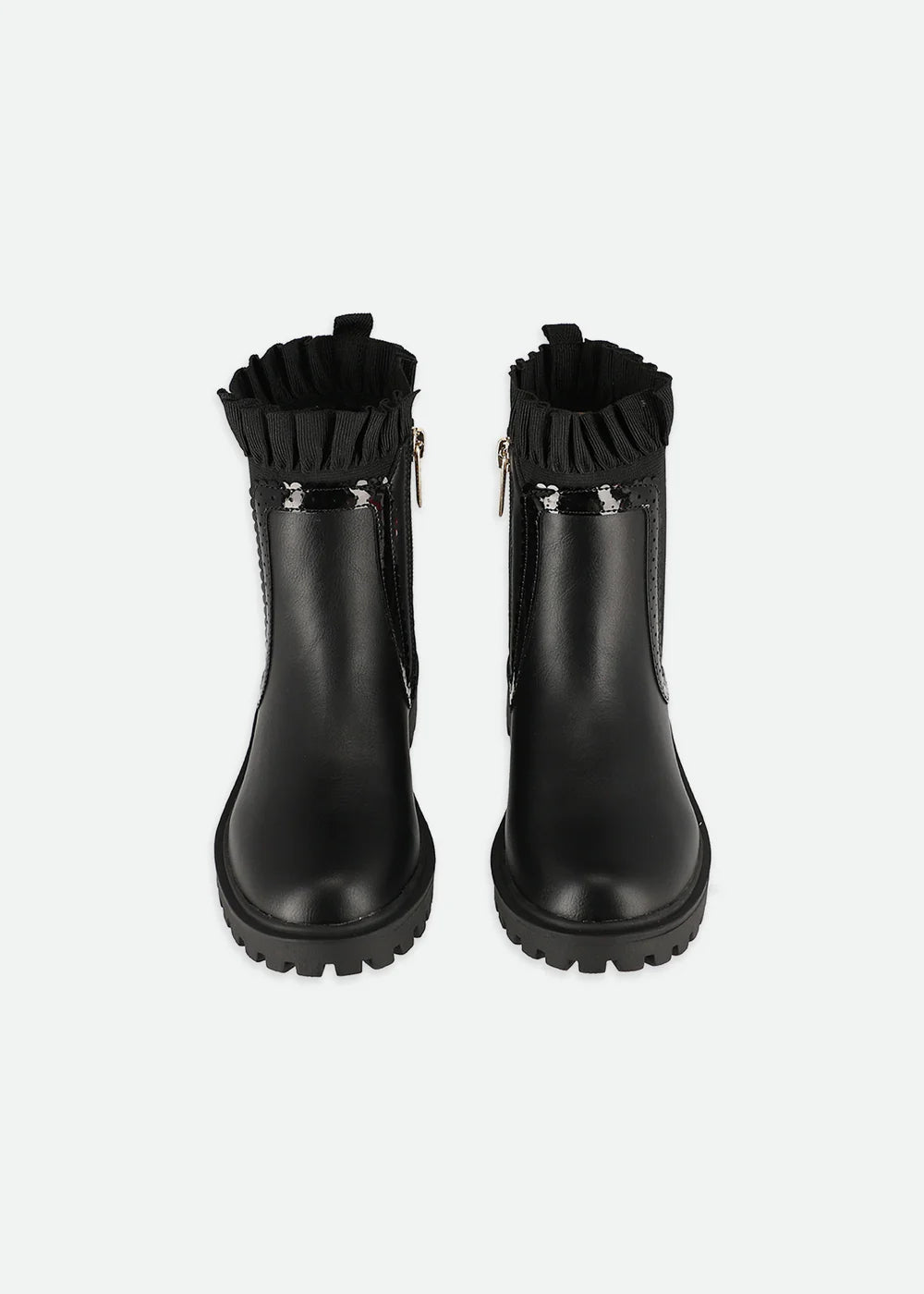 High-profile Chelsea boots with elastic gore, side zip, ruffle detail, and gold logo heart charm, featuring soft velour lining and chunky soles